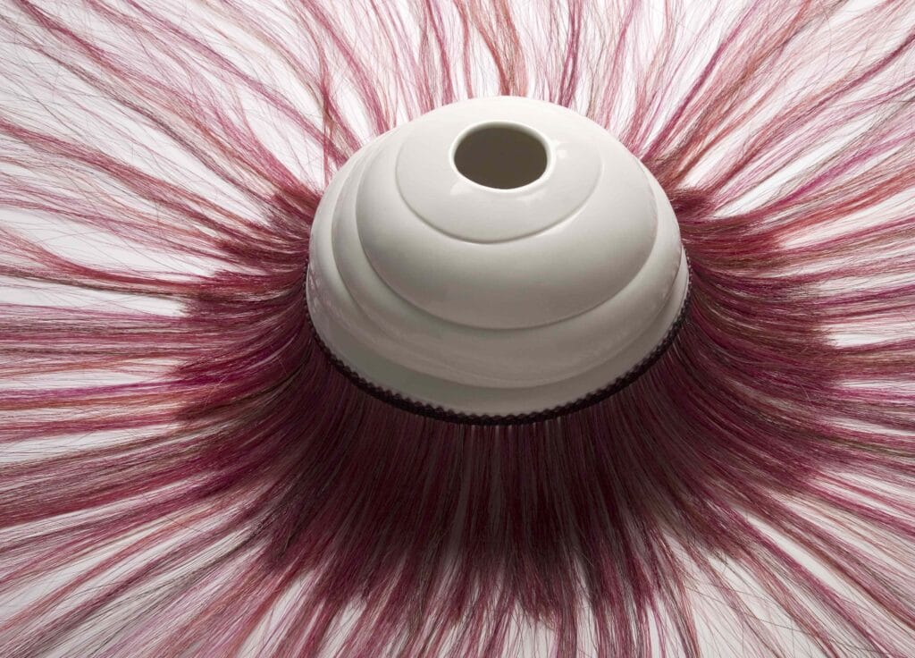 Marianne Kemp - collaboration porcelain horsehair ceramic vase with red horsehair
