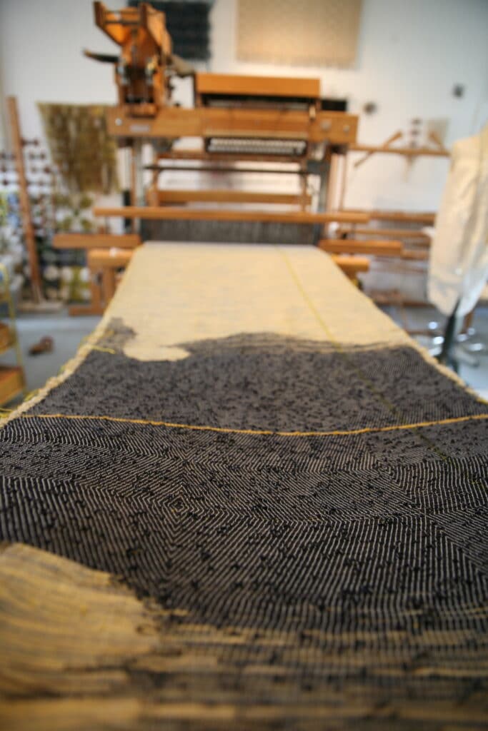 Marianne Kemp - handwoven fabric on the loom weaving on the loom