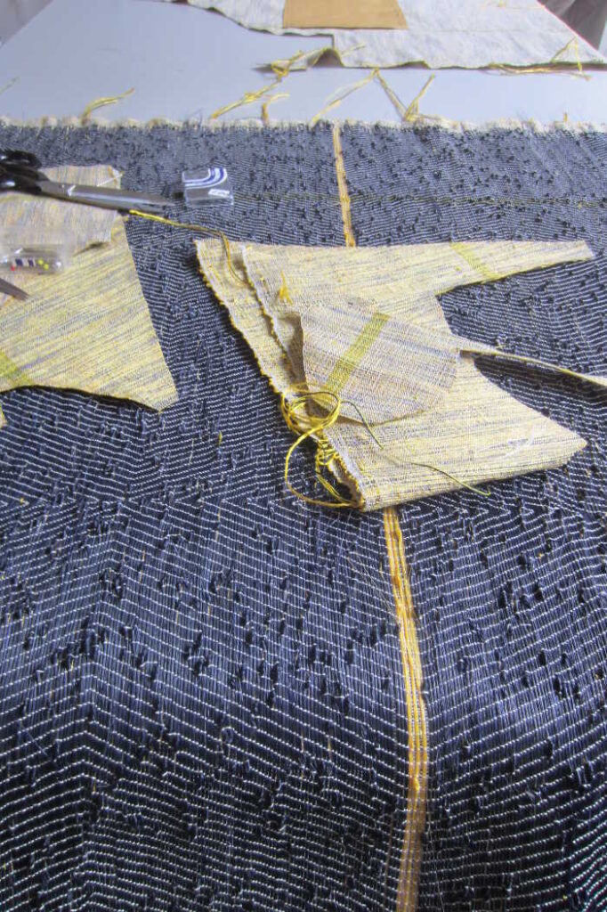 Marianne Kemp - fabric cut into dress blue horsehair weaving