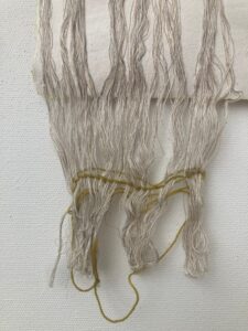 afb brown threads with green on white background